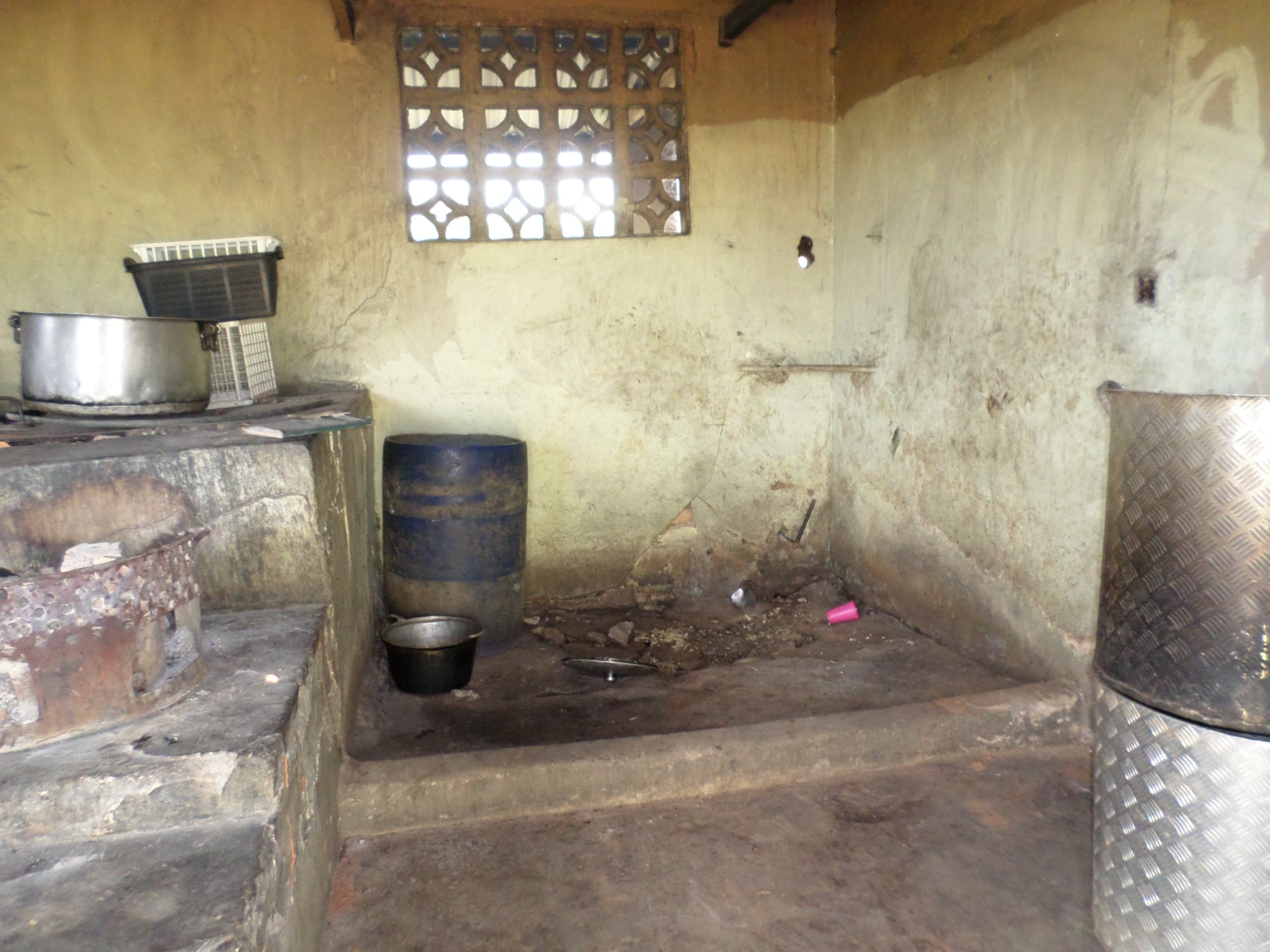 Filthy cracked interior walls and broken floor